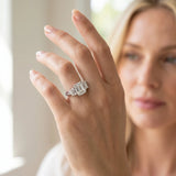 14K White Gold Three-Stone 3.09 Carat D VVS1 Round Cut Diamond Ring with Channel Set Band and Four-Prong Setting