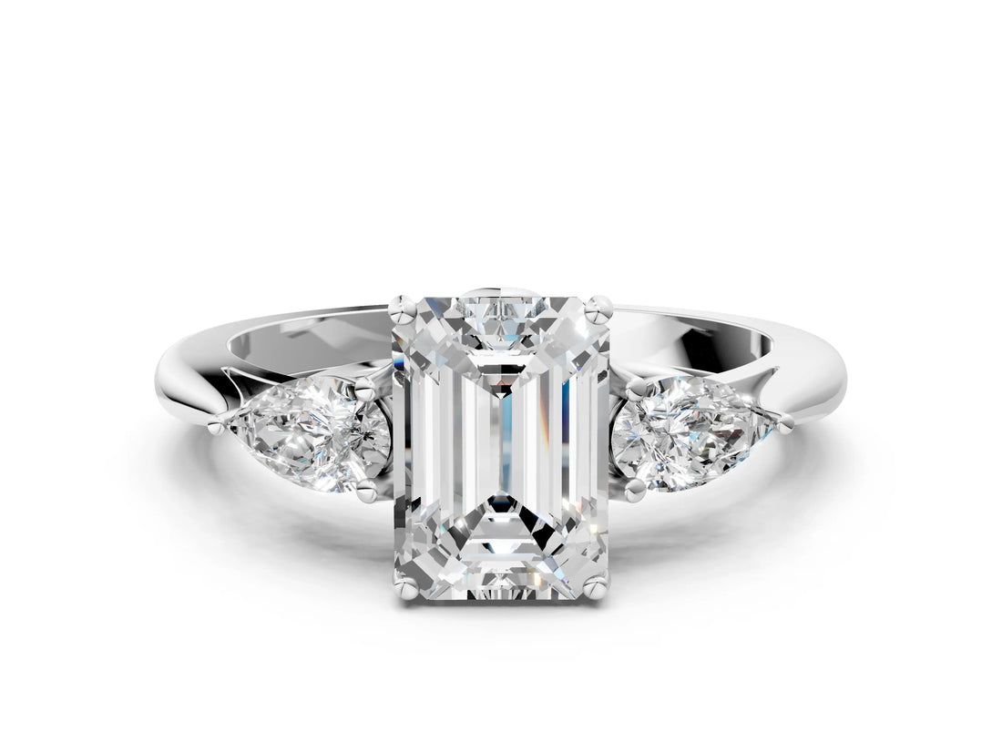 White gold Three-Stone Emerald Cut Diamond Ring with Pear  Side Stones in Four-Prong Setting_64