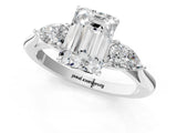 White gold Three-Stone Emerald Cut Diamond Ring with Pear  Side Stones in Four-Prong Setting_65