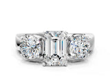 White gold Three-Stone Emerald Cut Diamond Ring with Round Side Stones, Classic Band, and Four-Prong Setting_7