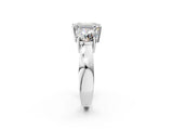 White gold Three-Stone Emerald Cut Diamond Ring with Round Side Stones, Classic Band, and Four-Prong Setting_9