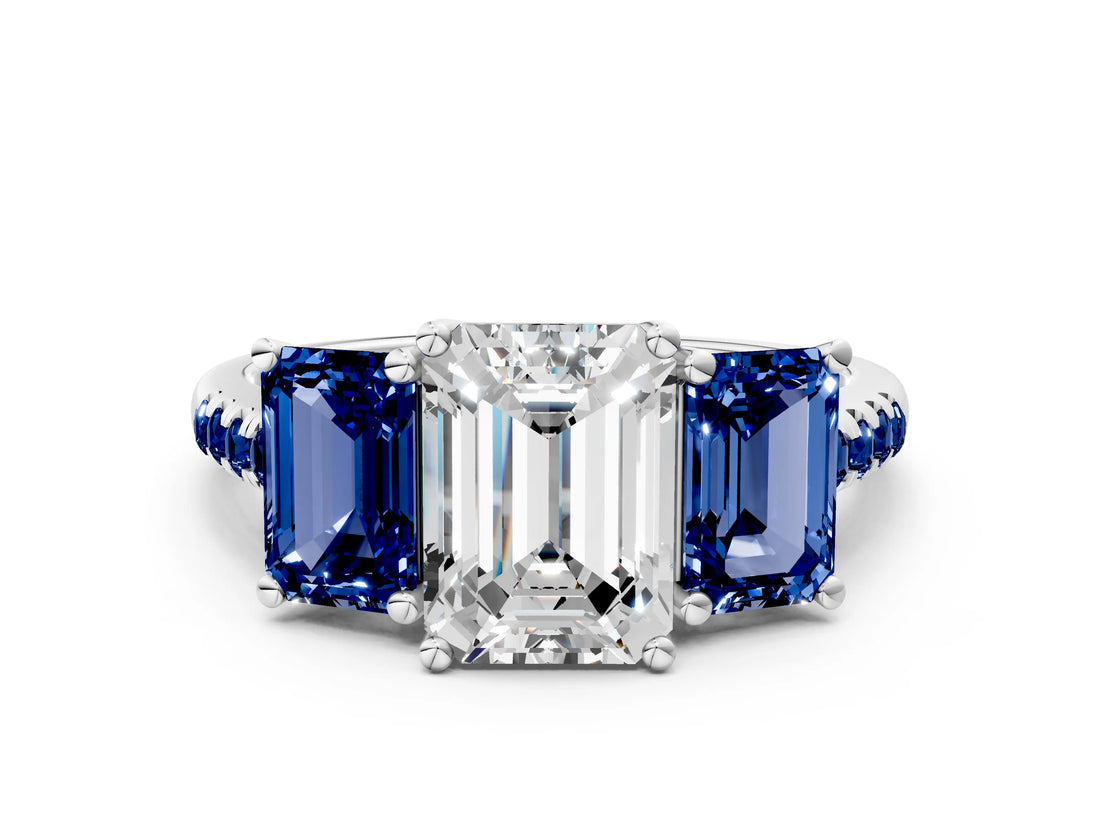 White gold Three-Stone Emerald Cut Diamond Ring with Round with Blue Sapphire side stone Pavé Band and Prong Setting_24