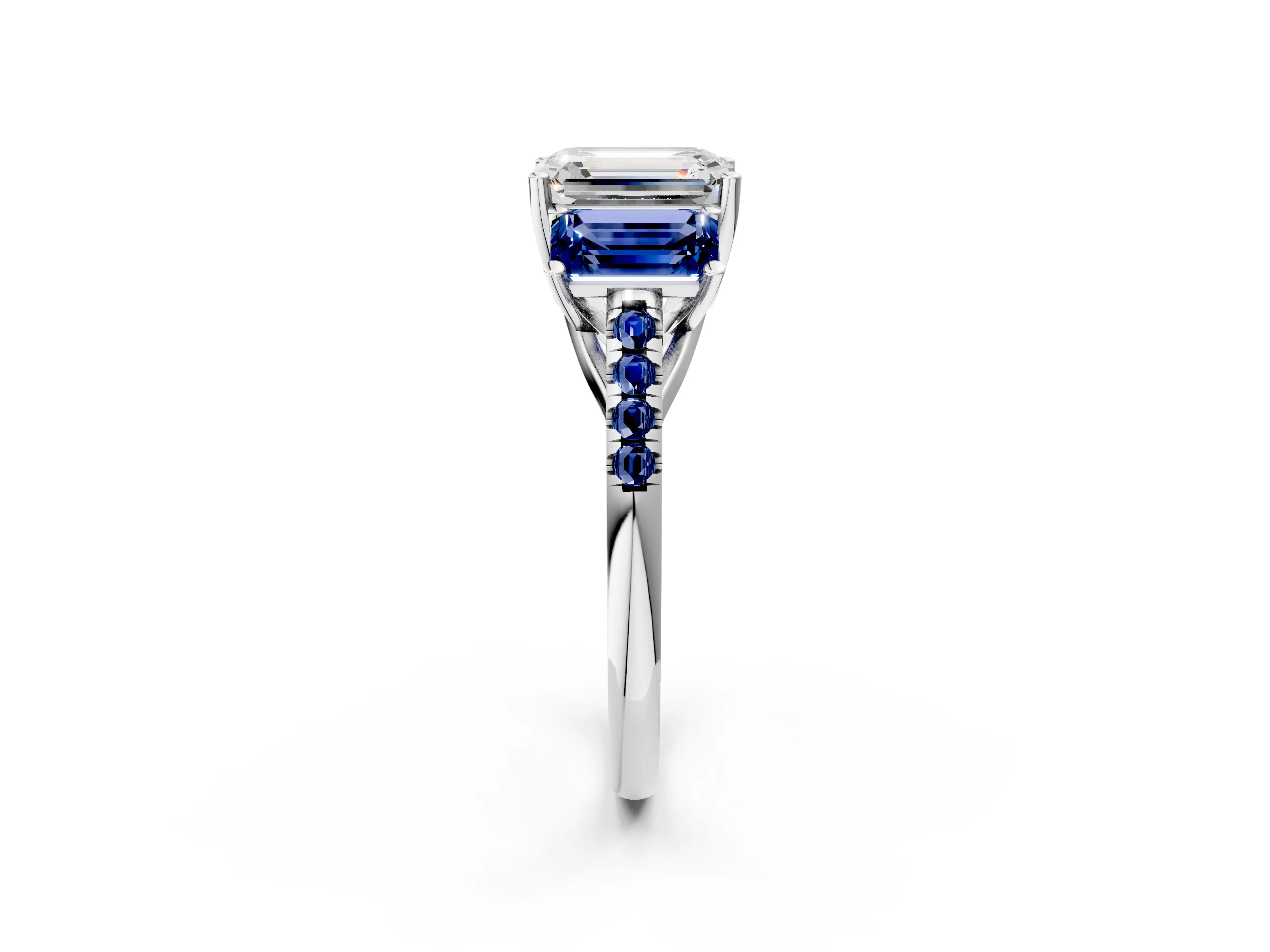 White gold Three-Stone Emerald Cut Diamond Ring with Round with Blue Sapphire side stone Pavé Band and Prong Setting_2