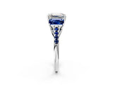 White gold Three-Stone Emerald Cut Diamond Ring with Round with Blue Sapphire side stone Pavé Band and Prong Setting_2