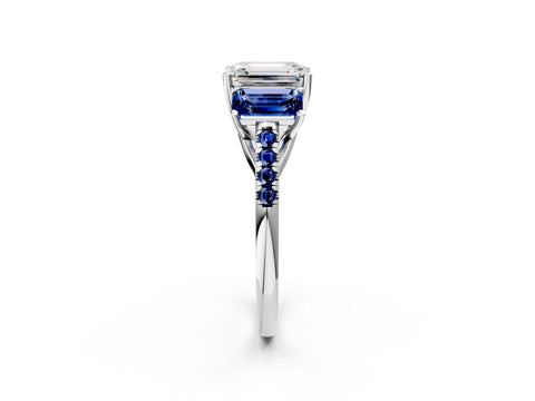 White gold Three-Stone Emerald Cut Diamond Ring with Round with Blue Sapphire side stone Pavé Band and Prong Setting_2