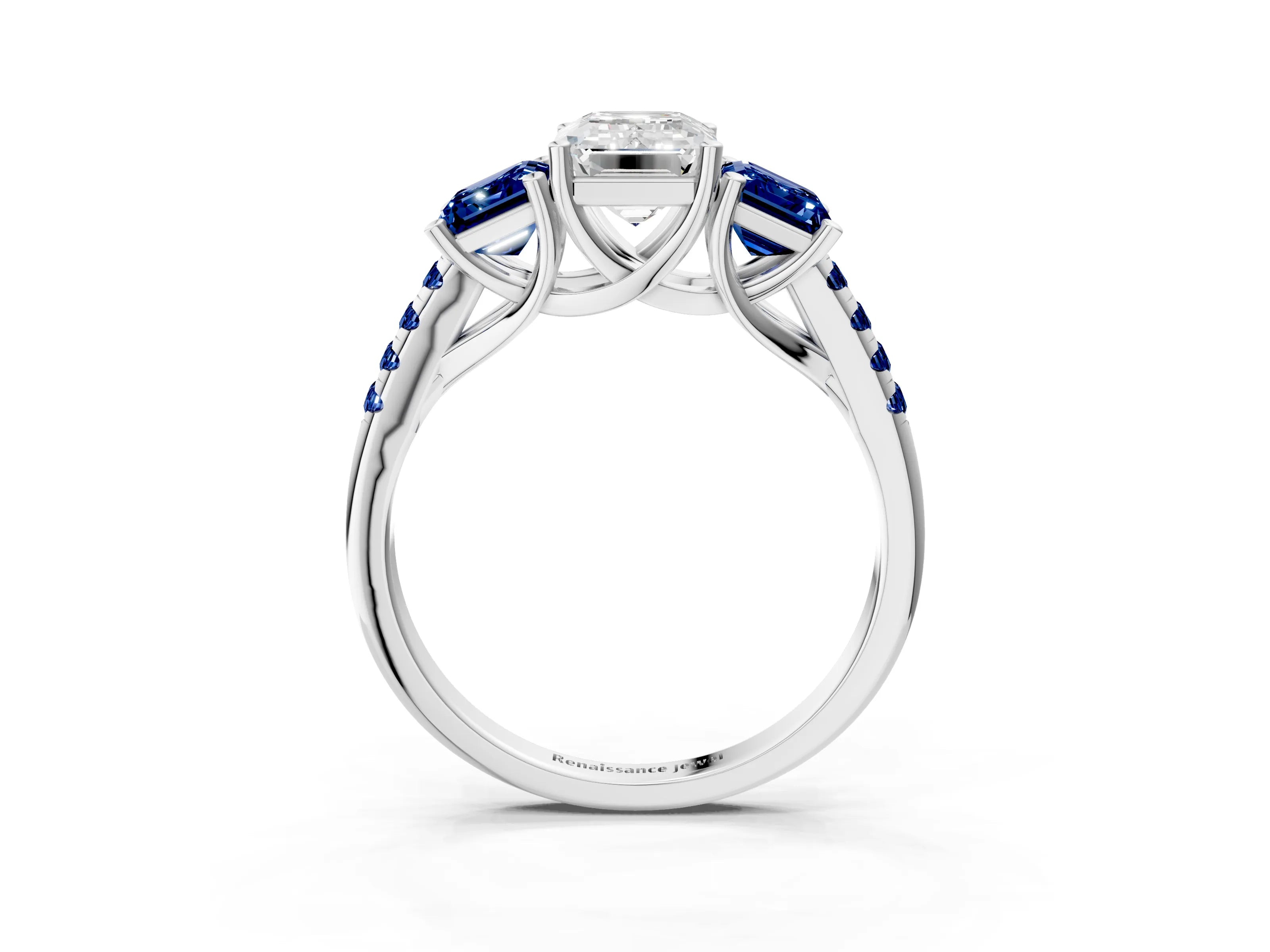 White gold Three-Stone Emerald Cut Diamond Ring with Round with Blue Sapphire side stone Pavé Band and Prong Setting_3