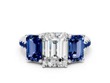 White gold Three-Stone Emerald Cut Diamond Ring with Round with Blue Sapphire side stone Pavé Band and Prong Setting_36