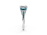 White gold Three-Stone Emerald Cut Diamond Ring with Round with Blue Topaz side stone Pavé Band and Prong Setting_21