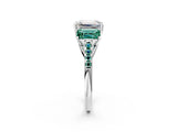 White gold Three-Stone Emerald Cut Diamond Ring with Round with Green Sapphire side stone Pavé Band and Prong Setting_14