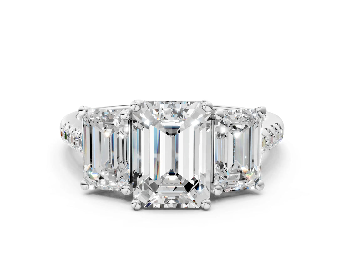 White gold Three-Stone Emerald Cut Diamond Ring with Round with Moissanite side stone Pavé Band and Prong Setting