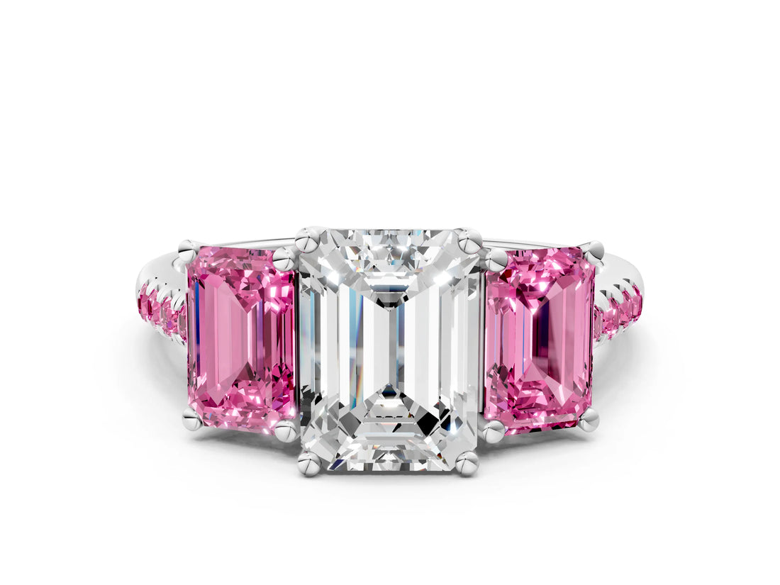 White gold Three-Stone Emerald Cut Diamond Ring with Round with Pink Sapphire side stone Pavé Band and Prong Setting