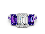 White gold Three-Stone Emerald Cut Diamond Ring with Round with Tanzanite side stone Pavé Band and Prong Setting