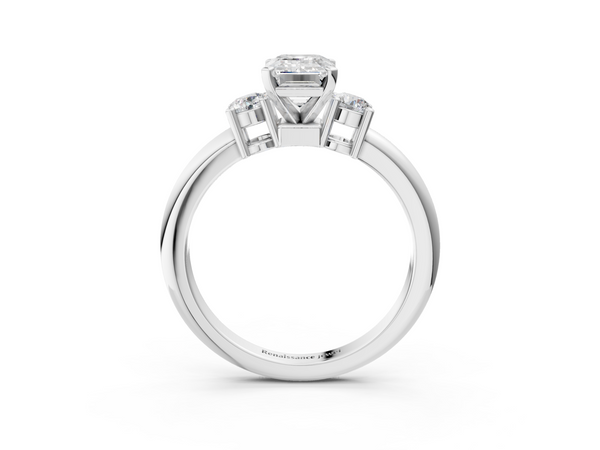 White gold Three-Stone Emerald Cut Diamond Solitaire with Prong Setting and Classic Band