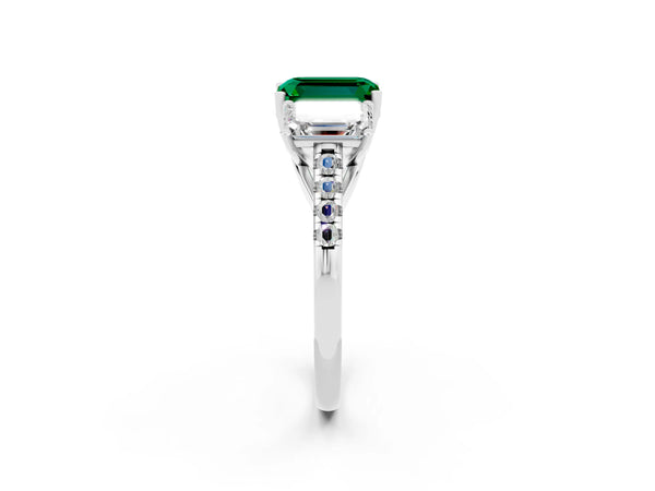 Platinum Three-Stone Emerald Cut Emerald Ring with Round  Pavé Band and Prong Setting