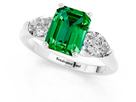 White gold Three-Stone Emerald Cut Emerald Ring with Pear Side Stones and Four-Prong Setting_1