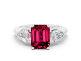 White gold Three-Stone Emerald Cut Garnet Ring with Pear Side Stones and Four-Prong Setting