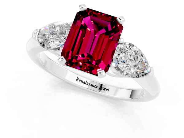 Silver Three-Stone Emerald Cut Garnet Ring with Pear Side Stones and Four-Prong Setting