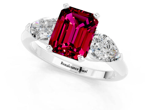 White gold Three-Stone Emerald Cut Garnet Ring with Pear Side Stones and Four-Prong Setting_1