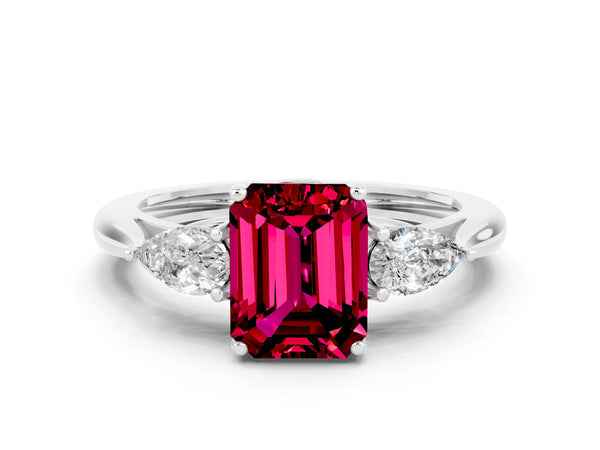 Platinum Three-Stone Emerald Cut Garnet Ring with Pear  Side Stones in Four-Prong Setting