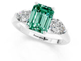White gold Three-Stone Emerald Cut Green Sapphire Ring with Pear Side Stones and Four-Prong Setting_1