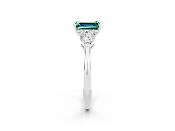 White gold Three-Stone Emerald Cut Green Sapphire Ring with Pear Side Stones and Four-Prong Setting