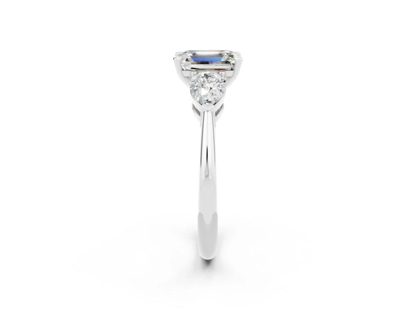 White gold Three-Stone Emerald Cut Moissanite Ring with Pear Side Stones and Four-Prong Setting