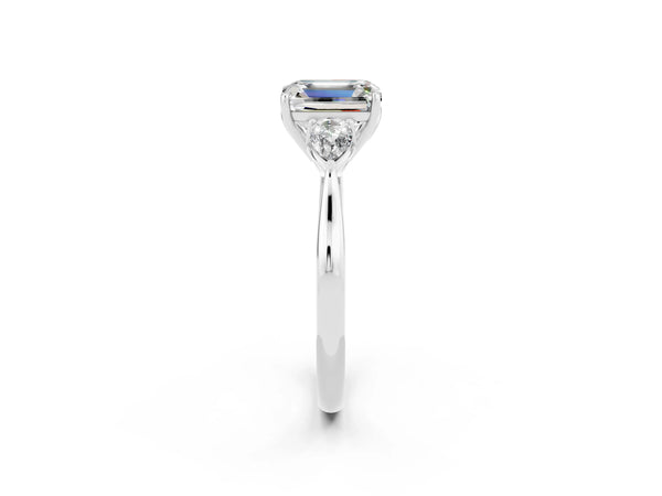White gold Three-Stone Emerald Cut Moissanite Ring with Pear  Side Stones in Four-Prong Setting