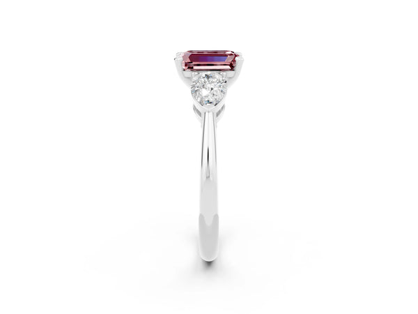 Platinum Three-Stone Emerald Cut Morganite Ring with Pear Side Stones and Four-Prong Setting