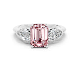 White gold Three-Stone Emerald Cut Morganite Ring with Pear Side Stones and Four-Prong Setting