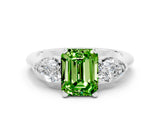 White gold Three-Stone Emerald Cut Peridot Ring with Pear Side Stones and Four-Prong Setting