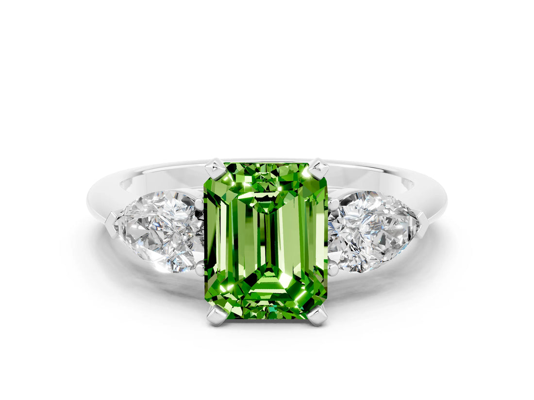 White gold Three-Stone Emerald Cut Peridot Ring with Pear Side Stones and Four-Prong Setting