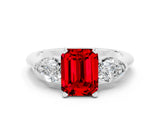White gold Three-Stone Emerald Cut Ruby Ring with Pear Side Stones and Four-Prong Setting