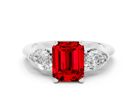 White gold Three-Stone Emerald Cut Ruby Ring with Pear Side Stones and Four-Prong Setting