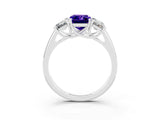 Platinum Three-Stone 2.82 Carat Emerald Tanzanite Engagement Ring with Prong Setting