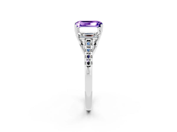 Platinum Three-Stone Emerald Cut Tanzanite Ring with Round  Pavé Band and Prong Setting