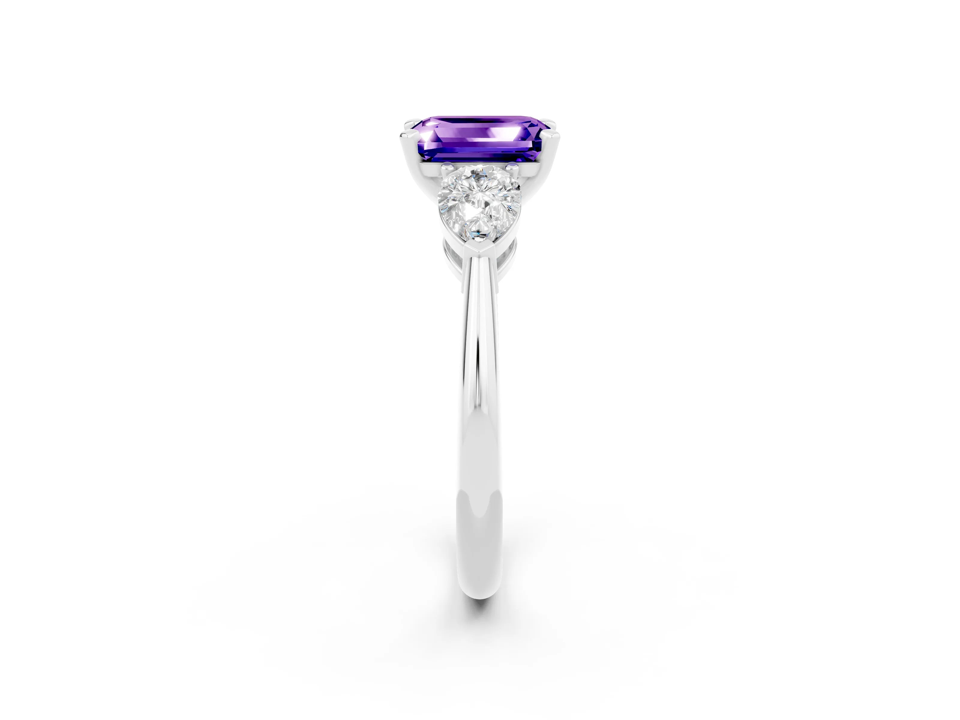White gold Three-Stone Emerald Cut Tanzanite Ring with Pear Side Stones and Four-Prong Setting_2