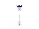 White gold Three-Stone Emerald Cut Tanzanite Ring with Pear Side Stones and Four-Prong Setting_2