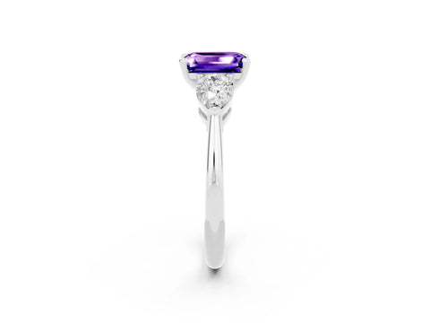 White gold Three-Stone Emerald Cut Tanzanite Ring with Pear Side Stones and Four-Prong Setting_2