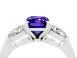 White gold Three-Stone Emerald Cut Tanzanite Ring with Pear Side Stones and Four-Prong Setting_4
