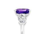 White gold Three-Stone Emerald Cut Tanzanite Ring with Pear Side Stones and Four-Prong Setting_5