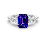 White gold Three-Stone Emerald Cut Tanzanite Ring with Pear  Side Stones in Four-Prong Setting_12