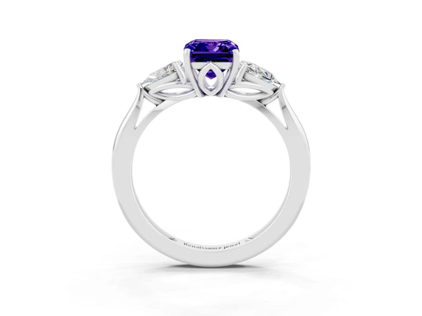 Platinum Three-Stone Emerald Cut Tanzanite Ring with Pear  Side Stones in Four-Prong Setting