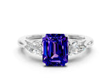White gold Three-Stone Emerald Cut Tanzanite Ring with Pear  Side Stones in Four-Prong Setting_48