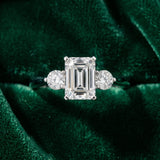 White gold Three-Stone Emerald Solitaire Ring with Tapered Band and Four-Prong Setting_7