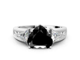 White gold Three-Stone Fancy Black Heart Cut Cut Diamond Ring with Trillion Side Stones on a Split Shank Band