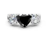 White gold Three-Stone Fancy Black Heart Cut Diamond Ring with Round Side Stones, Classic Band, and Four-Prong Setting