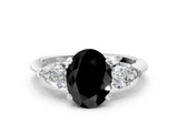White gold Three-Stone Fancy Black Oval Cut Diamond Ring with Pear Side Stones and Four-Prong Setting