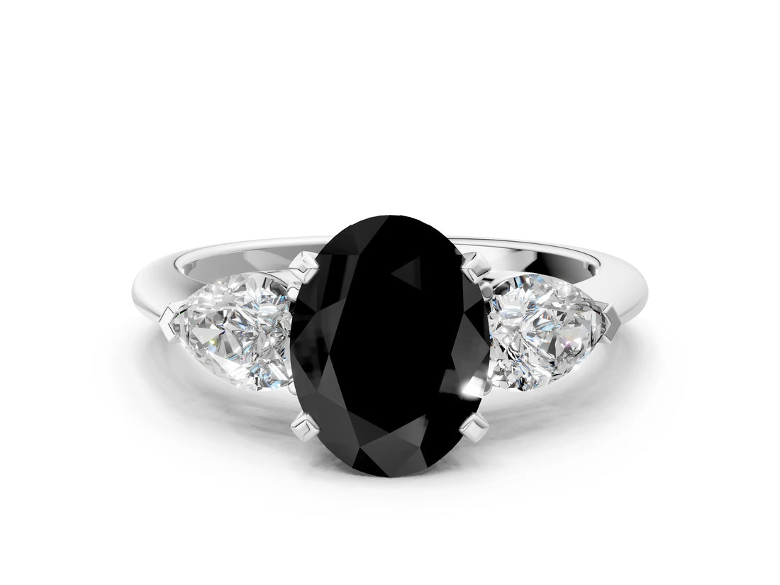 White gold Three-Stone Fancy Black Oval Cut Diamond Ring with Pear Side Stones and Four-Prong Setting