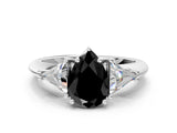 White gold Three-Stone Fancy Black Pear Cut Cut Diamond Ring with Trillion Side Stones and Four-Prong Setting_11