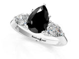 White gold Three-Stone Fancy Black Pear Cut Diamond Ring with Pear Side Stones and Four-Prong Setting_1